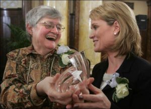 Sister Sandy Rodemyer (left), Food Pantry Director from 1995-2007, is presented the Iowa Star Award by Laura Hollingsworth (right), then-publisher of The Des Moines Register, on February 5, 2008.